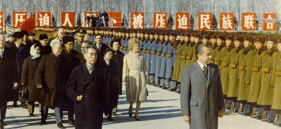 Premier Zhou Enlai and President Richard Nixon review Chinese troops on February 26, 1972 (Nixon Presidential Materials Project, National Archives).