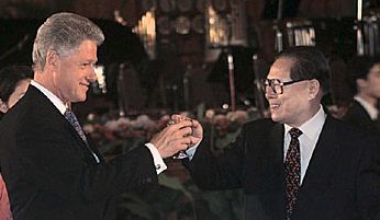 President Bill Clinton and Premier Jiang Zemin toast one another during the president's trip to China in June 1998 (White House).