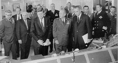 President John F. Kennedy at the Command Post during a tour of Strategic Air Command Headquarters, Offut Air Force Base, Nebraska, December 1962.